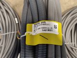 a bunch of hoses that are on the ground