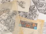 beaucoup de dessins posés sur une pile de papiers