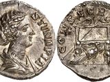 a silver coin with an image of a woman and a man on it