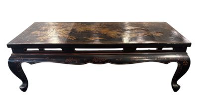 une photo d'une table basse noire avec un plateau en marbre