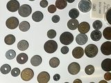a lot of coins that are on the table