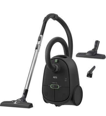un gros plan d'un aspirateur muni d'un tuyau et d'autres accessoires