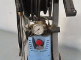 an image of a pressurer with a hose attached to it