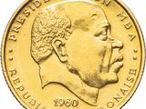 an image of a close up of a gold coin with a man ' s face on it