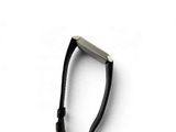 a black leather strap with a silver buckle on it