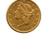 l'image d'une pièce d'or sur laquelle figure une tête de femme