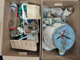 two boxes that have a lot of items in them