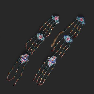 a pair of beaded bracelets with colorful designs on them