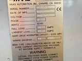 an image of a metal sign on the side of a machine