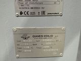 two air dryers with labels on them on the wall