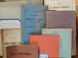 many books that are sitting on top of a table