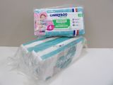 two packs of baby diapers sitting on top of each other