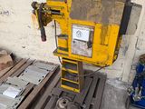 a machine that is sitting on a pallet in a warehouse