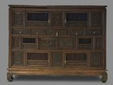 an image of a large wooden chest of drawers
