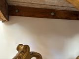 a bed with a wooden headboard and a wooden foot board