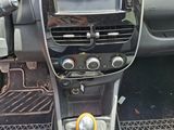 a picture of a car dashboard with a steering control