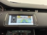 the dashboard of a car with a gps device in the center