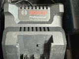 a black and decker power tool sitting on top of a table
