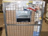 a metal cart with a bunch of boxes on top of it