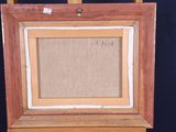 an old picture frame with a picture of a cat on it