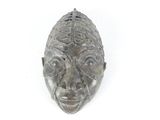 a close up of a sculpture of a person ' s face