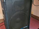 the speaker is sitting on the floor in the room