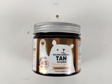 a close up of a jar of honey with a bear face on it
