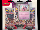 three packs of pokemon trading cards are in a package