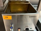 une photo d'une friteuse professionnelle équipée d'un bac jaune