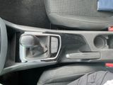 an image of a car dashboard with a cup holder