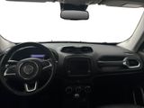 the interior of a small car with a steering wheel and dashboard