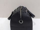 a black leather bag with a zipper on the front