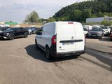 a white van that is parked in a parking lot