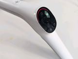 a close up of a white device on a table