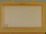 painting on easel with a yellow frame and a white background