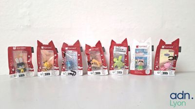 a lot of small toys that are lined up together