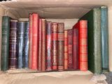 a box full of books sitting on a table