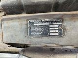a close up of a motorcycle engine with a label on it