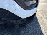 a close up view of a car ' s front bumper