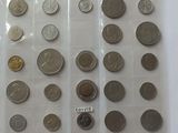 a lot of coins in a plastic bag on a table