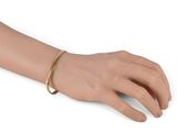 a close up of a person ' s hand with a bracelet on it