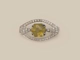 a yellow sapphire and diamond ring