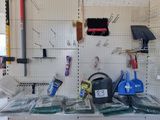 a shelf with various items on it in a store