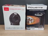 two boxes of powerta heaters sitting on a table next to each other