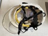a white helmet with a black strap and a white helmet with a yellow band