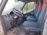 the interior of a van with the driver ' s seat up