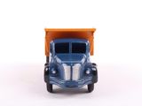 a toy truck that is sitting on a white surface