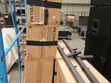 a stack of boxes sitting on a pallet in a warehouse