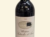 a bottle of wine that is sitting on a table