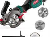 the green circular saw is being used to cut a piece of wood